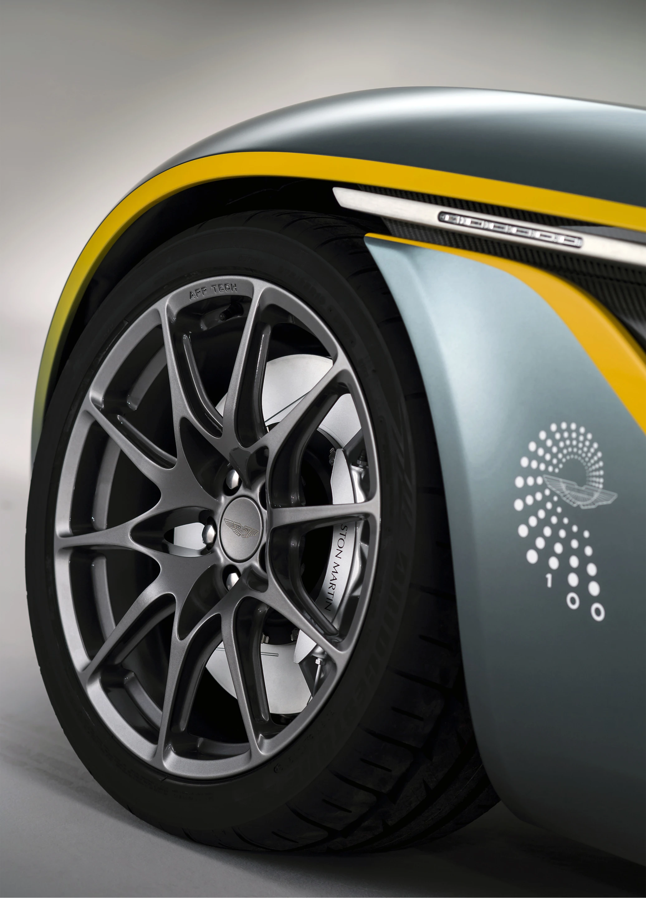 Aston Martin's signature race colours and 100th Anniversary decals populate the carbon fibered concept