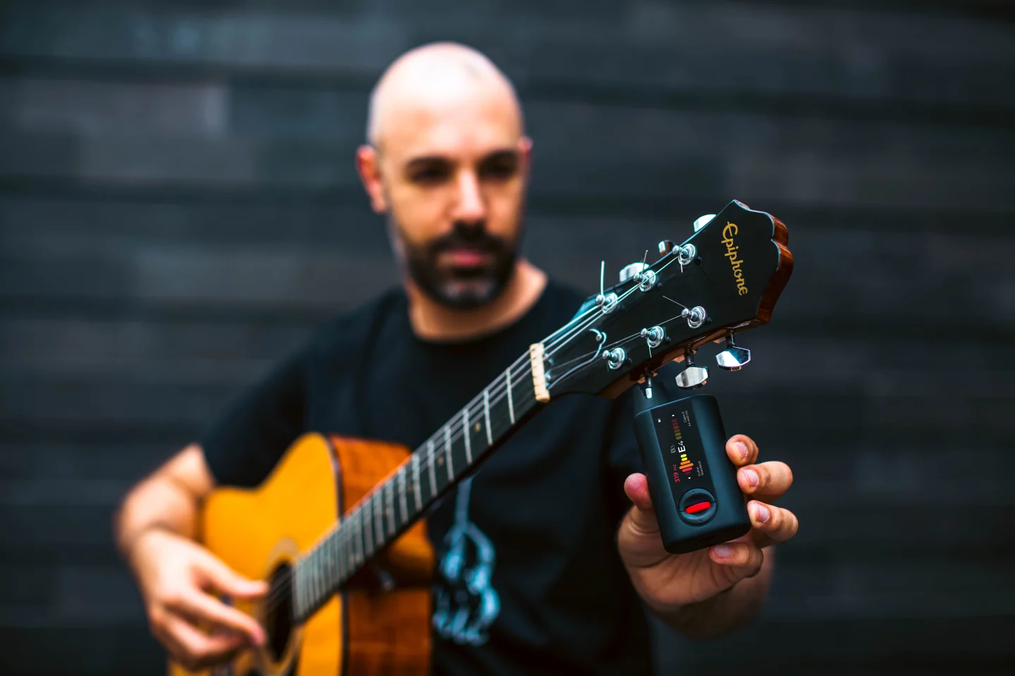 Choose your instrument, pop the winder onto a peg and pluck the string