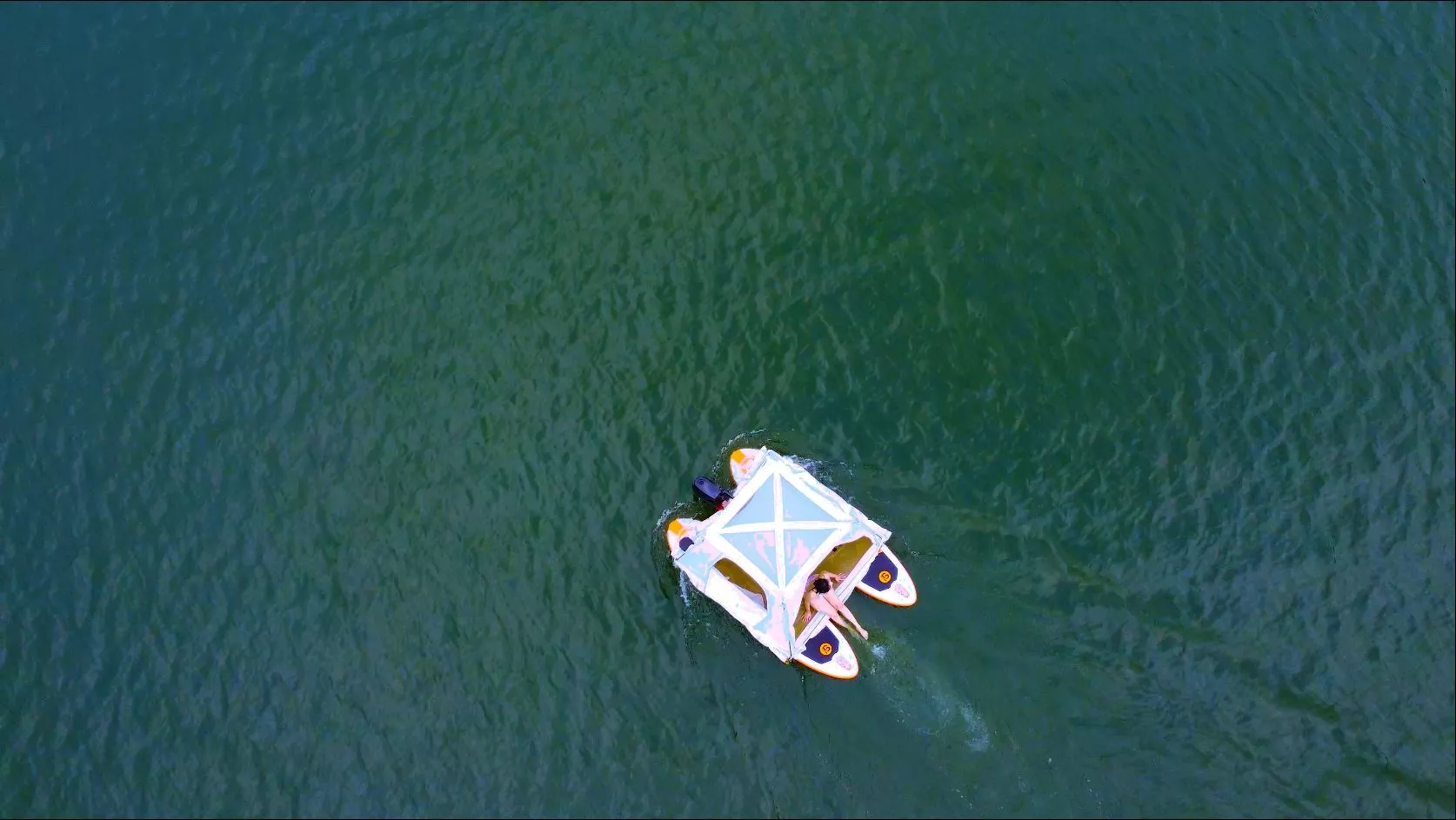The Dookan can drop atop a pair of paddleboards and become a water-top lounger