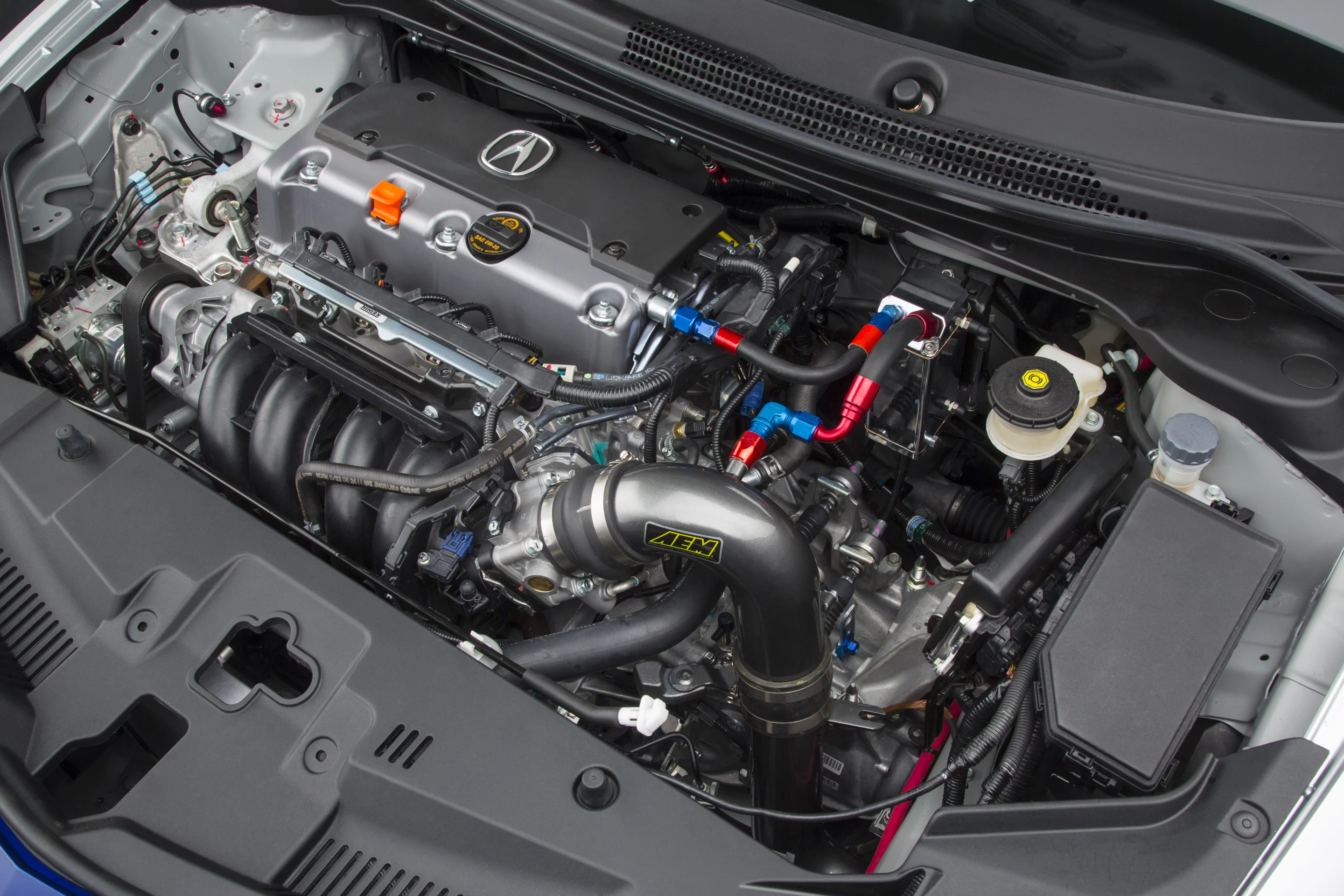 An AEM intake upgrades the engine