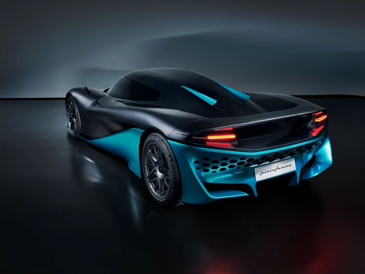 A range around 350 miles and a top speed over 200 mph, at a weight vastly lighter than an electric performance car
