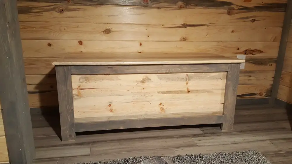 The Tiny Giant's loft includes a storage chest