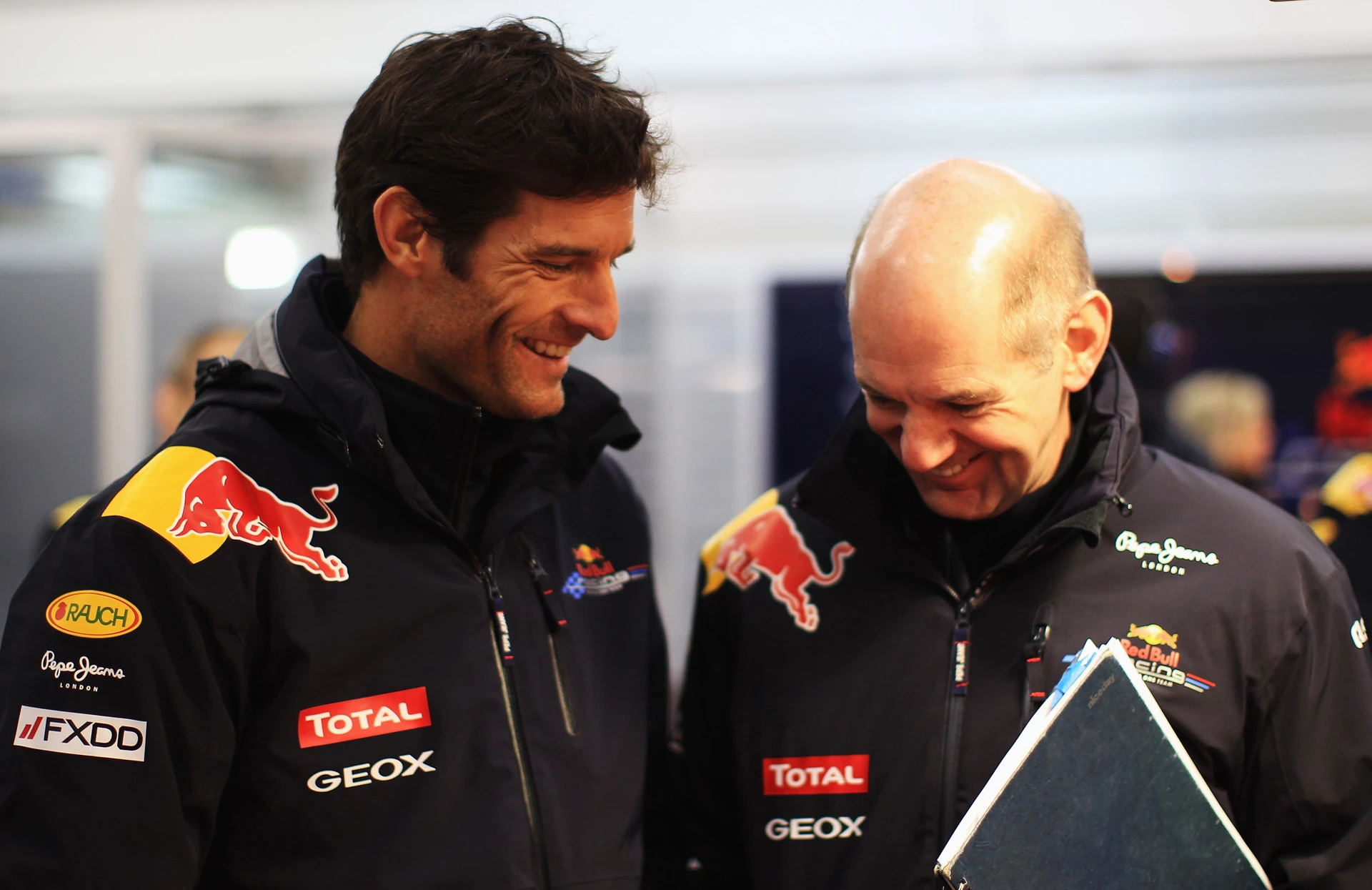 Red Bull driver Mark Webber and the man who designed the RB7, Adrian Newey.