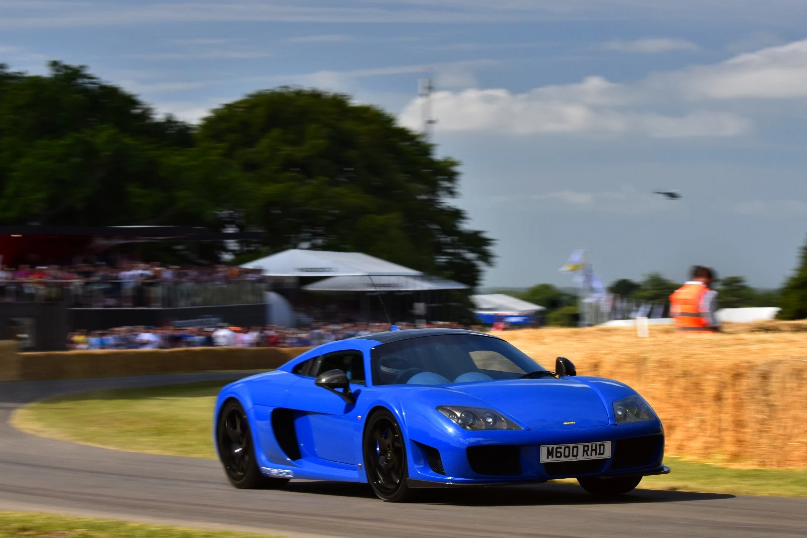 Anthony Reid claimed victory in the annual Michelin Supercar Run after ascending the hill in 51.33 seconds in the British-built Noble M600. Reid’s time was 0.78 seconds faster than the Lexus LFA piloted by Chris Ward, while third spot went to the all-new Aston Martin GT12 driven by Matt Becker, Chief Engineer, Vehicle Attributes at Aston Martin. Although not part of the Supercar competition, last year’s victor, Jann Mardenborough, followed the Supercar batch up the Hill in the unique Nissan Juke-R 2.0, and set a time that would have been good enough for third spot