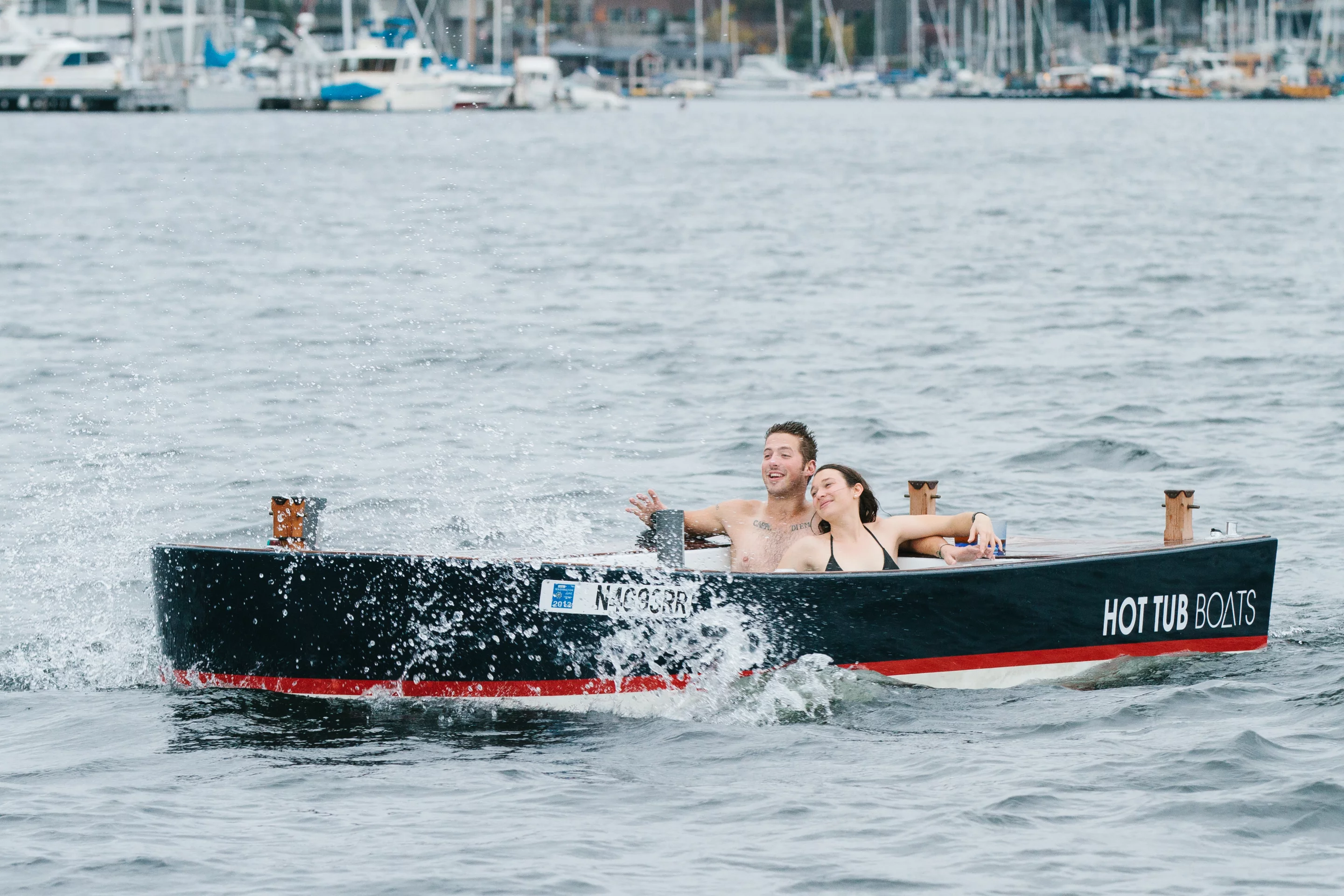 The Hot Tub Boat allows its passengers to soak while they cruise