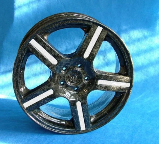 June 16, 2007 Lightweight wheels are a must-have for automotive enthusiasts as they significantly decrease unsprung weight and improve handling characteristics accordingly. Though fiber-composite materials are used in elite motorsport, and promise better
