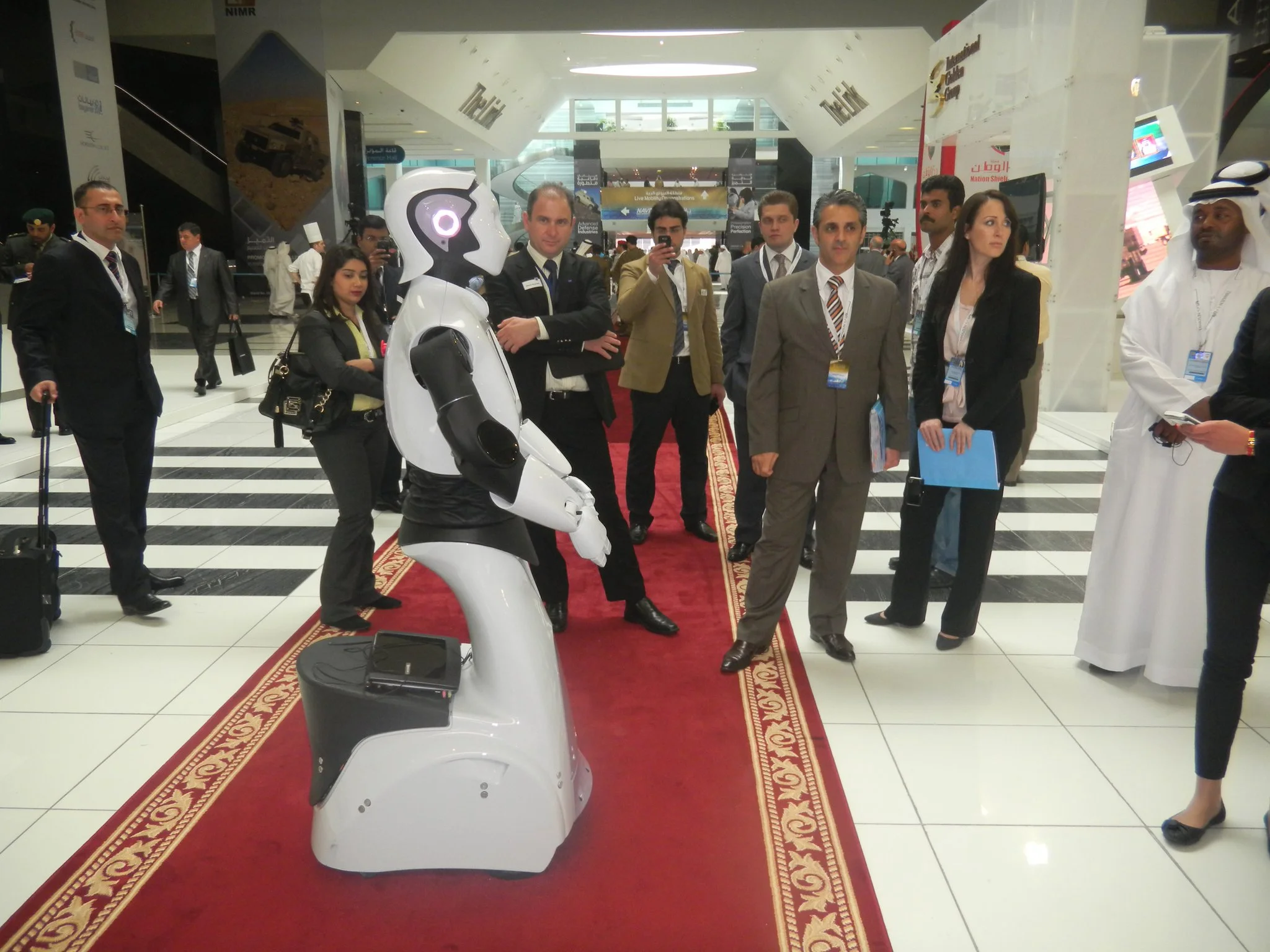 REEM could carry bags on the back of its wheeled base