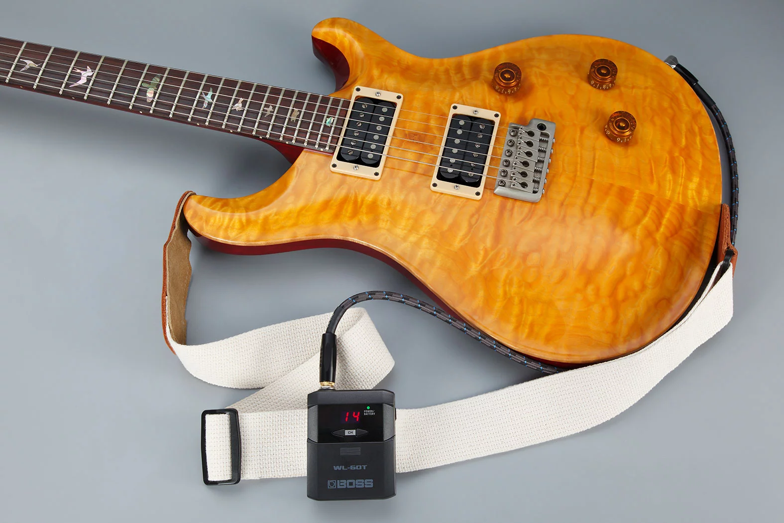 The WL-60 Wireless System's transmitter is designed to be mounted to a strap or belt