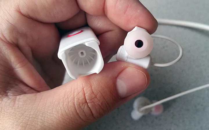 The Phiaton BT 100 NC earphones store the buds into the end of each 'arm'