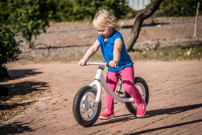 A high-seated balancing bike