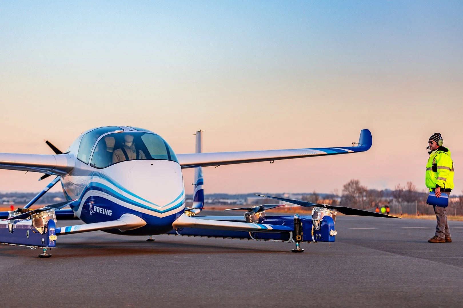 The PAV utilizes four sets of rotors for vertical takeoffs and landings, along with a rear propeller for forward flight