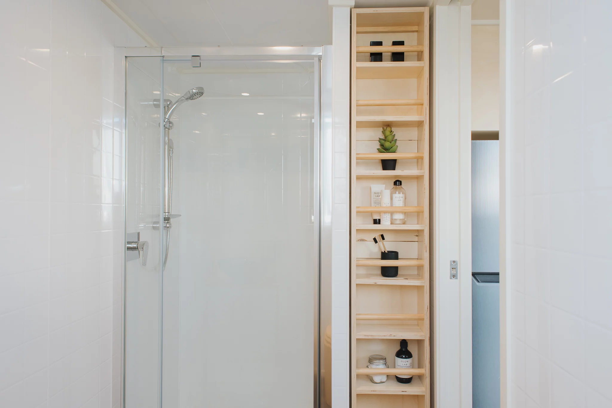 The Daisy Vera Tiny House's bathroom has a shower