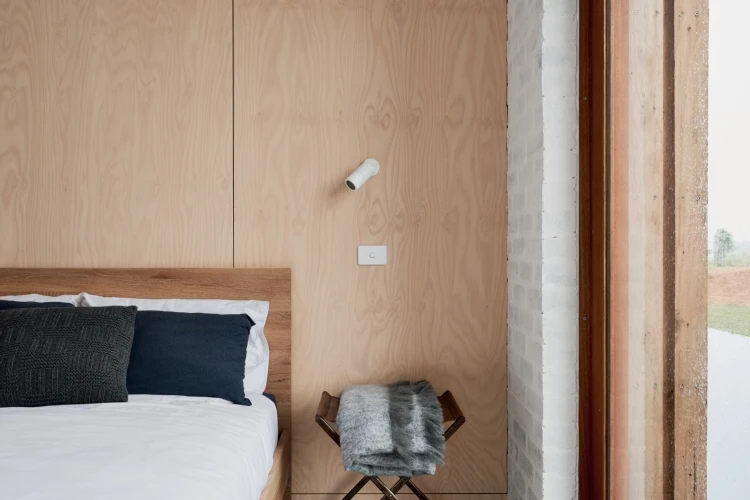 The home is complete with a sleek bathroom and simple open bedroom designs