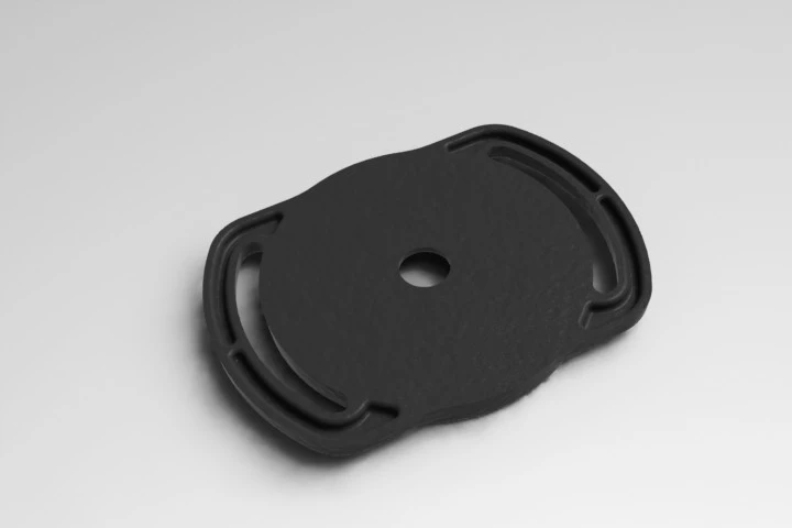 Each lens cap holder is designed to hold three or four different-sized lens caps (two on one side and one or two on the other), although (obviously) only one cap can be secured in the holder at any one time