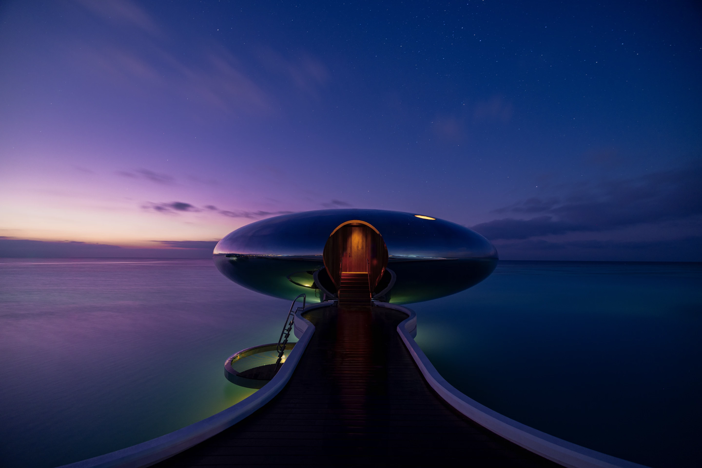 Shebara Resort's sea-based pod residences are reached using a jetty from the shore