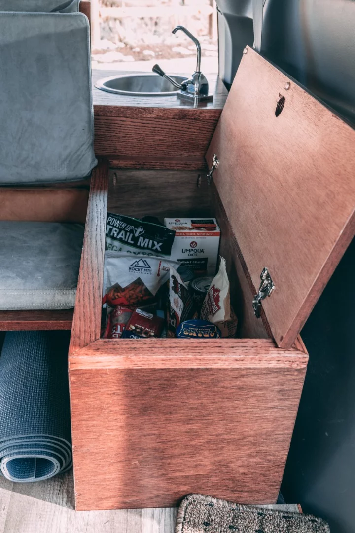 This driver-side box sits right behind the kitchen and serves as a food pantry