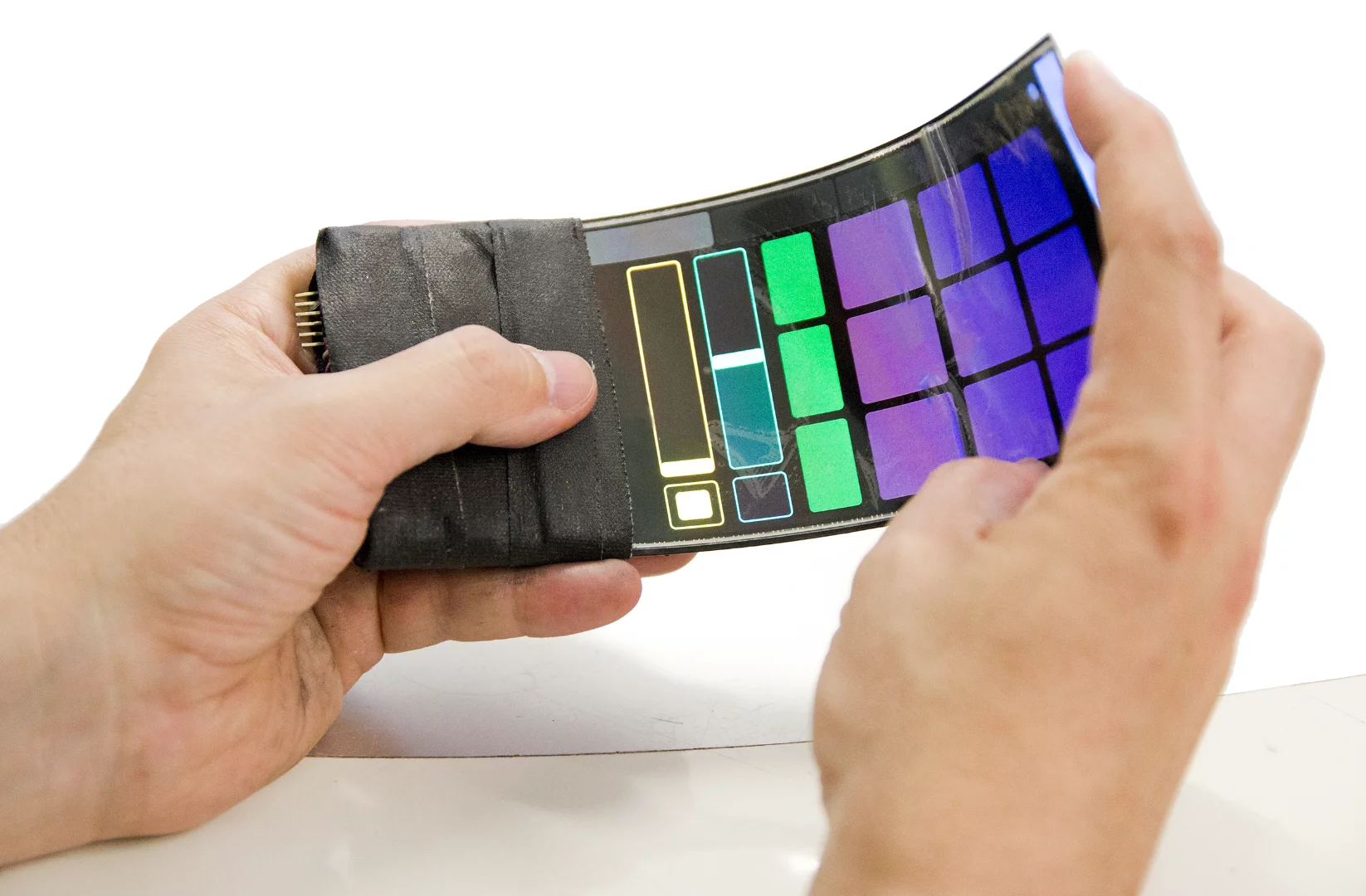 The WhammyPhone includes a bend sensor that registers display bends, twists and squeezes and converts them into virtual instrument sounds