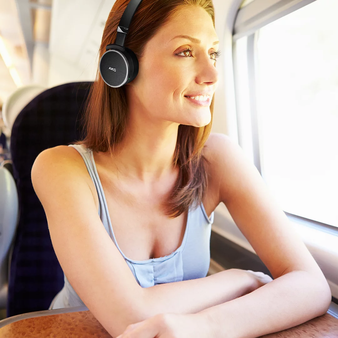 The AKG N60 headphones are designed to lower volume of what is being listened to when the wearer's name is called