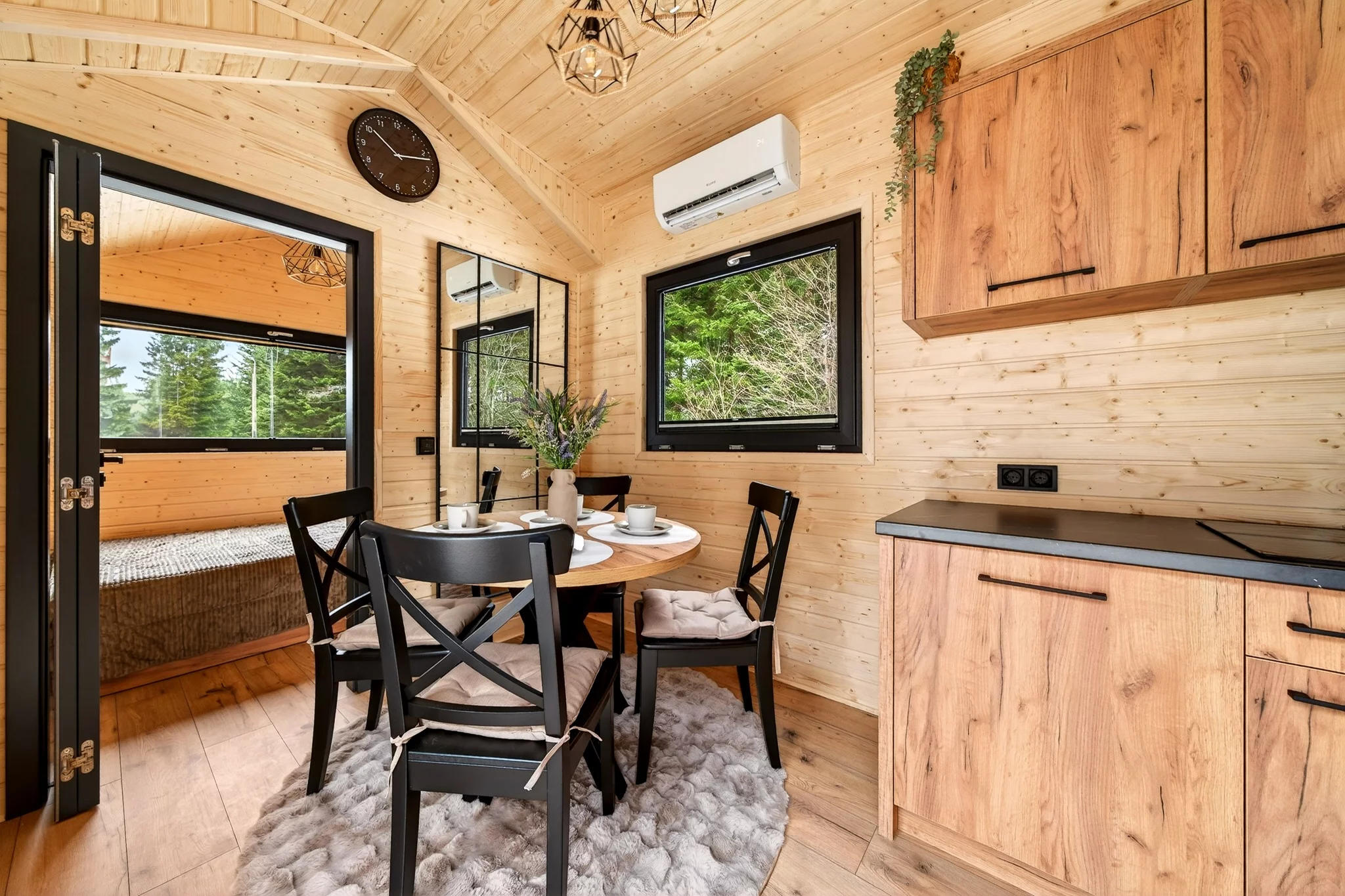 The Justine features a dining table with seating for four, as per the owner's wishes, though it could have a sofa installed instead