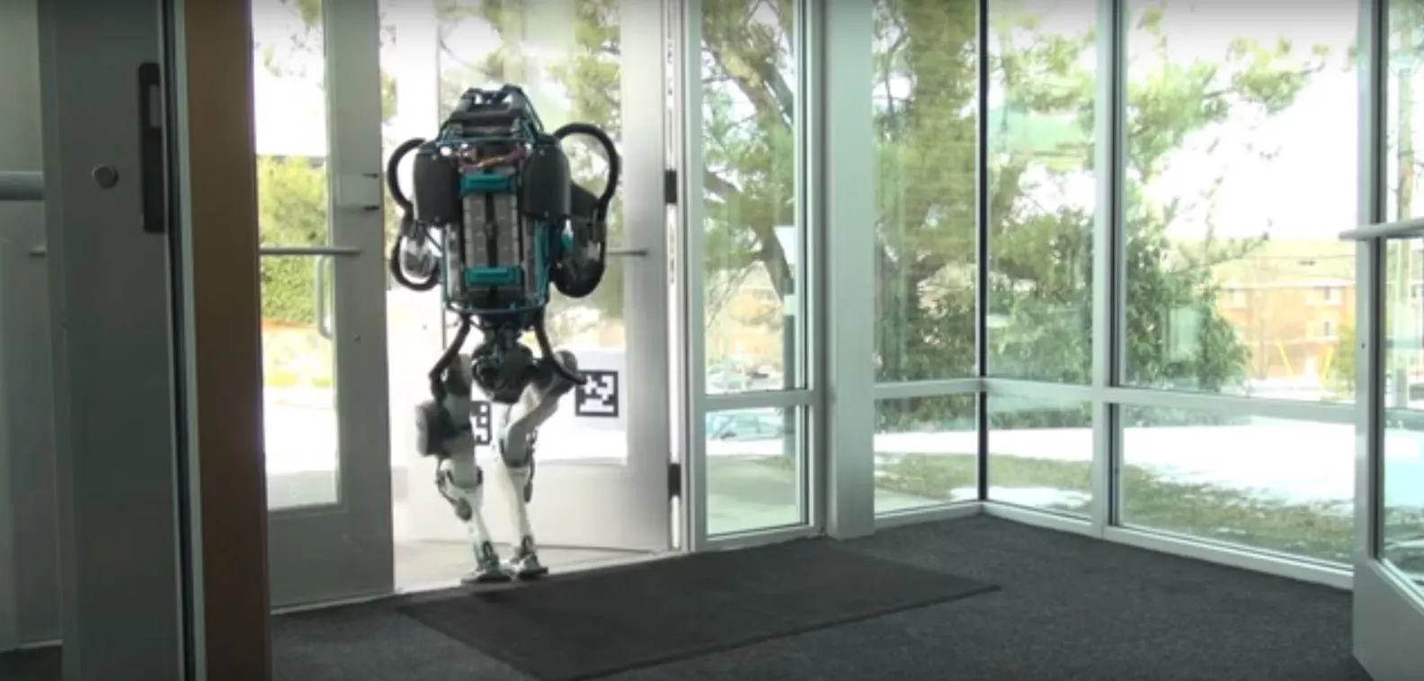 The latest Atlas robot negotiating a door