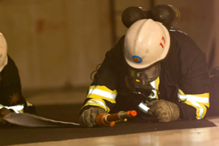 Firefighters testing the shoe-based digital positioning system 25 m below ground (Photo: Erik Groundstroem)