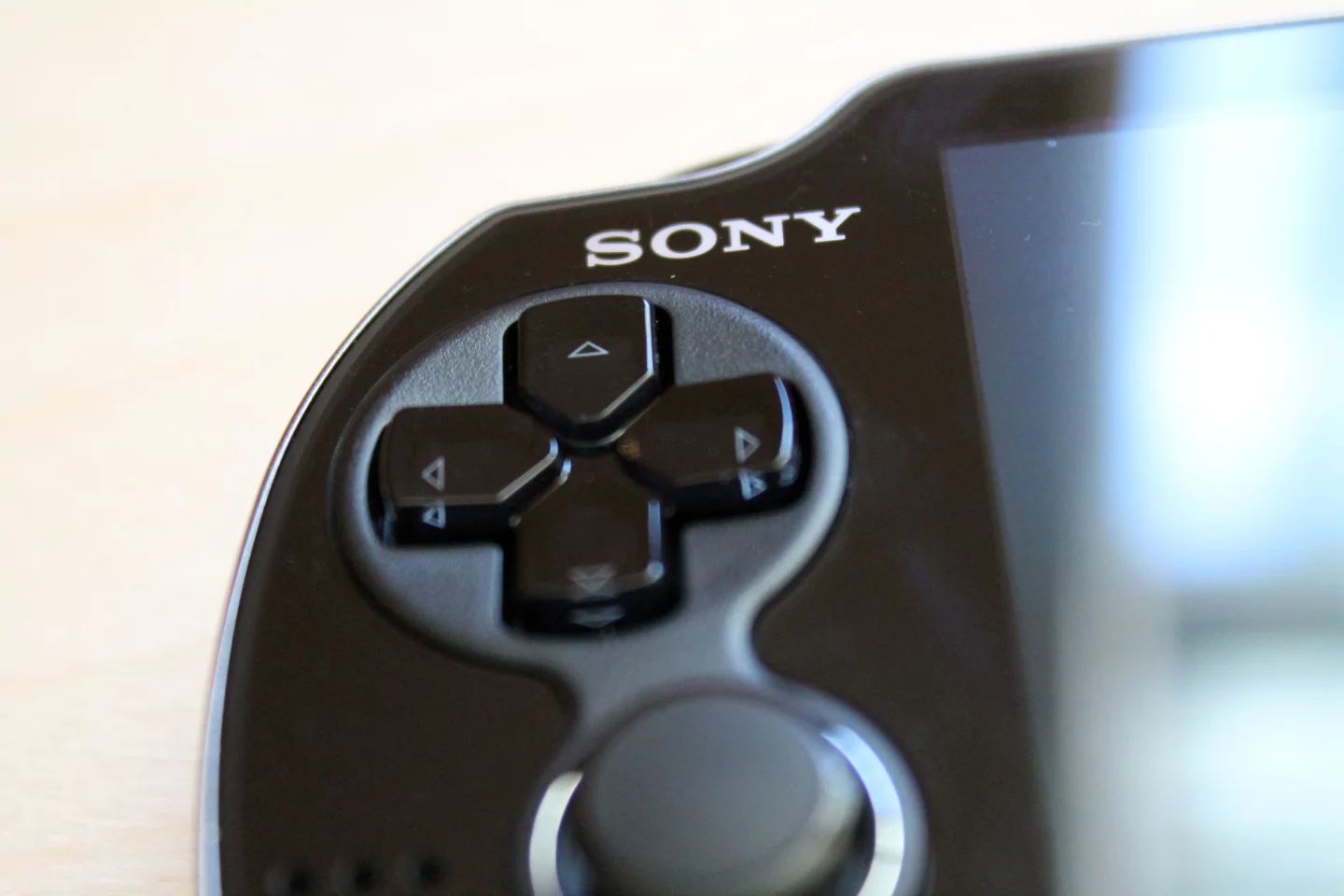 The Vita's D-Pad is sufficiently raised, and comfortable to use