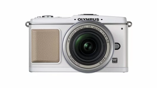 The Olympus E-P1 shown in white with tan faux-leather grip