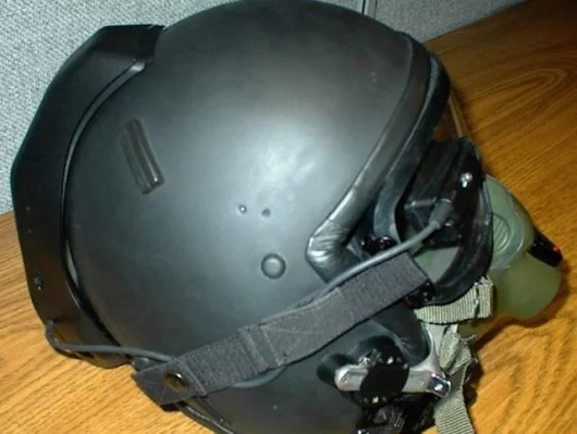 The Military Free Fall Navigation System for the Marine Corps mounts a Global Positioning System (GPS) onto the parachutist helmet. The system is wired to a TV-like display attached to the goggles to give users directions on where to steer the canopy.