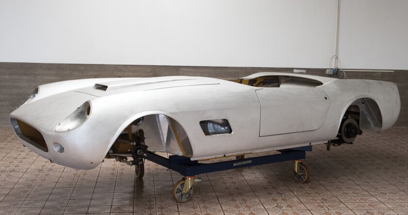 There are signs of intense activity in restoring this collection, with numerous bare metal bodies of significant cars involved. This is a replica Ferrari 250 GT LWB California Spider body but there are bodies in the collection for two Ferrari 250 GTE 2+2, a Porsche 550 Spyder, and a Ferrari 250 GT SWB.