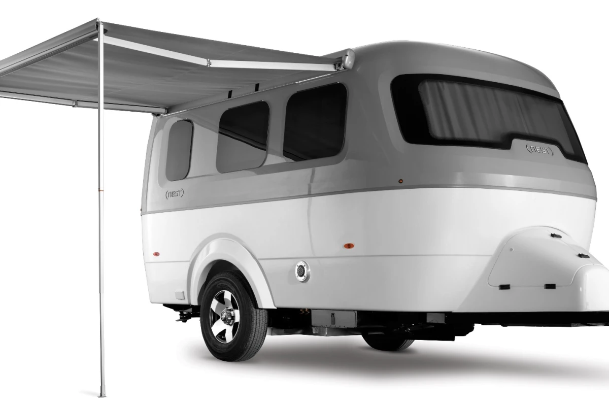 The Nest comes with a generous standard equipment package, including AC, heat, a powered awning and a microwave