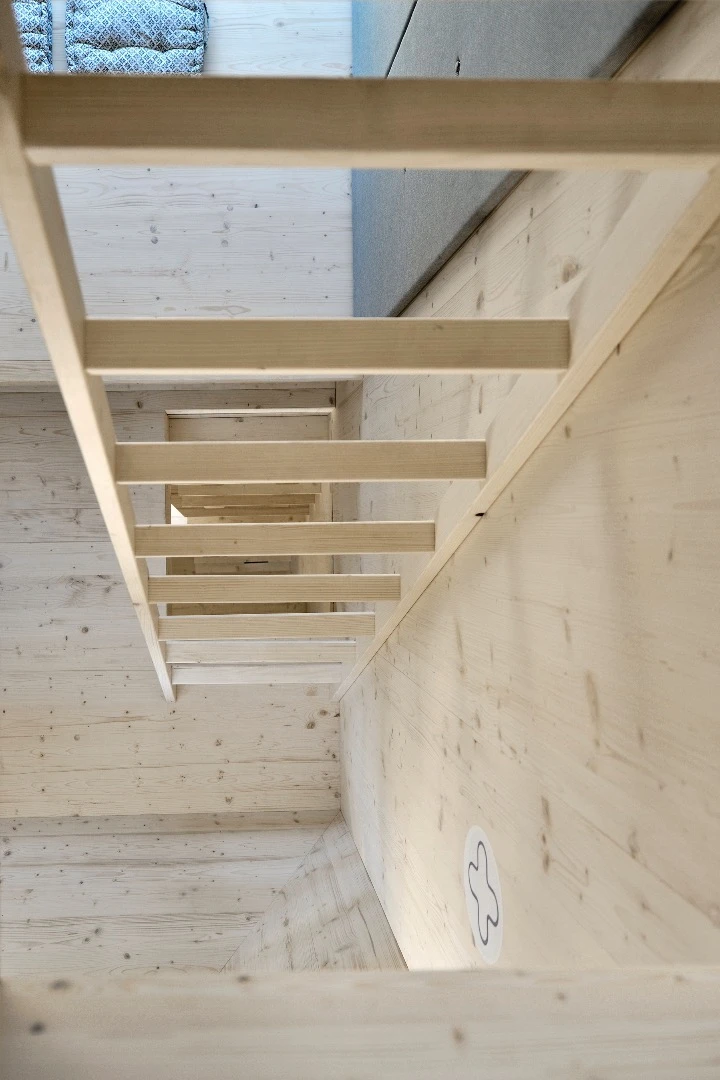 A ladder offers access between floors