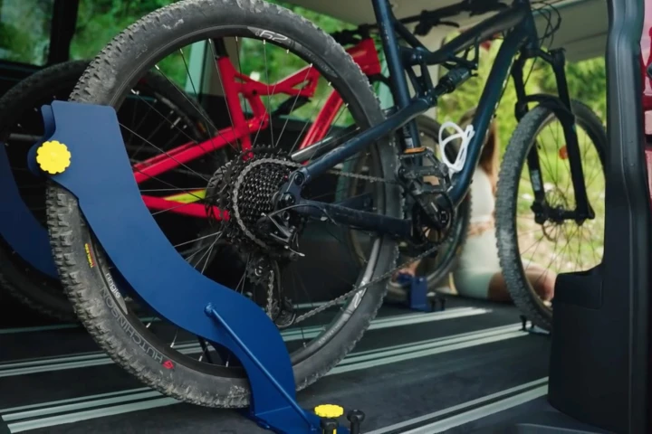 The Slide&Go's rear wheel unit (pictured) sandwiches the rear tire between two steel plates