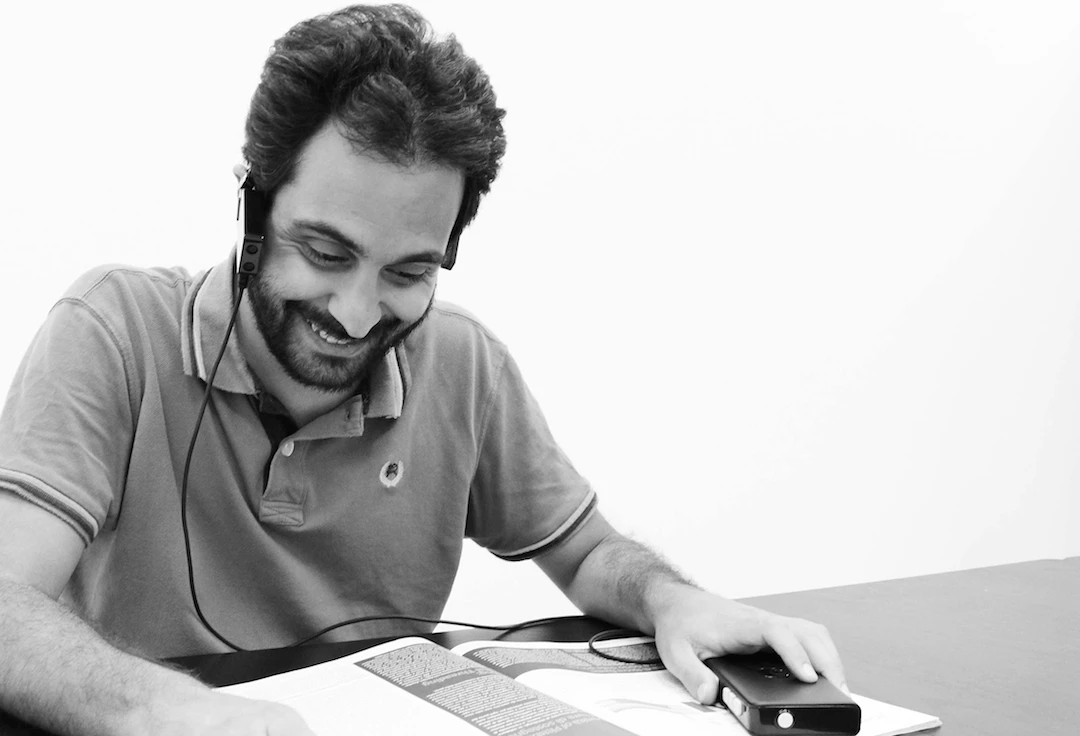 Horus is a wearable device that describes the world to visually impaired people, and can read signs and even books aloud