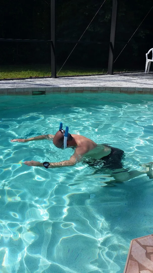 The first time you put your face in the water with the Powerbreather is strange, but you quickly get used to it