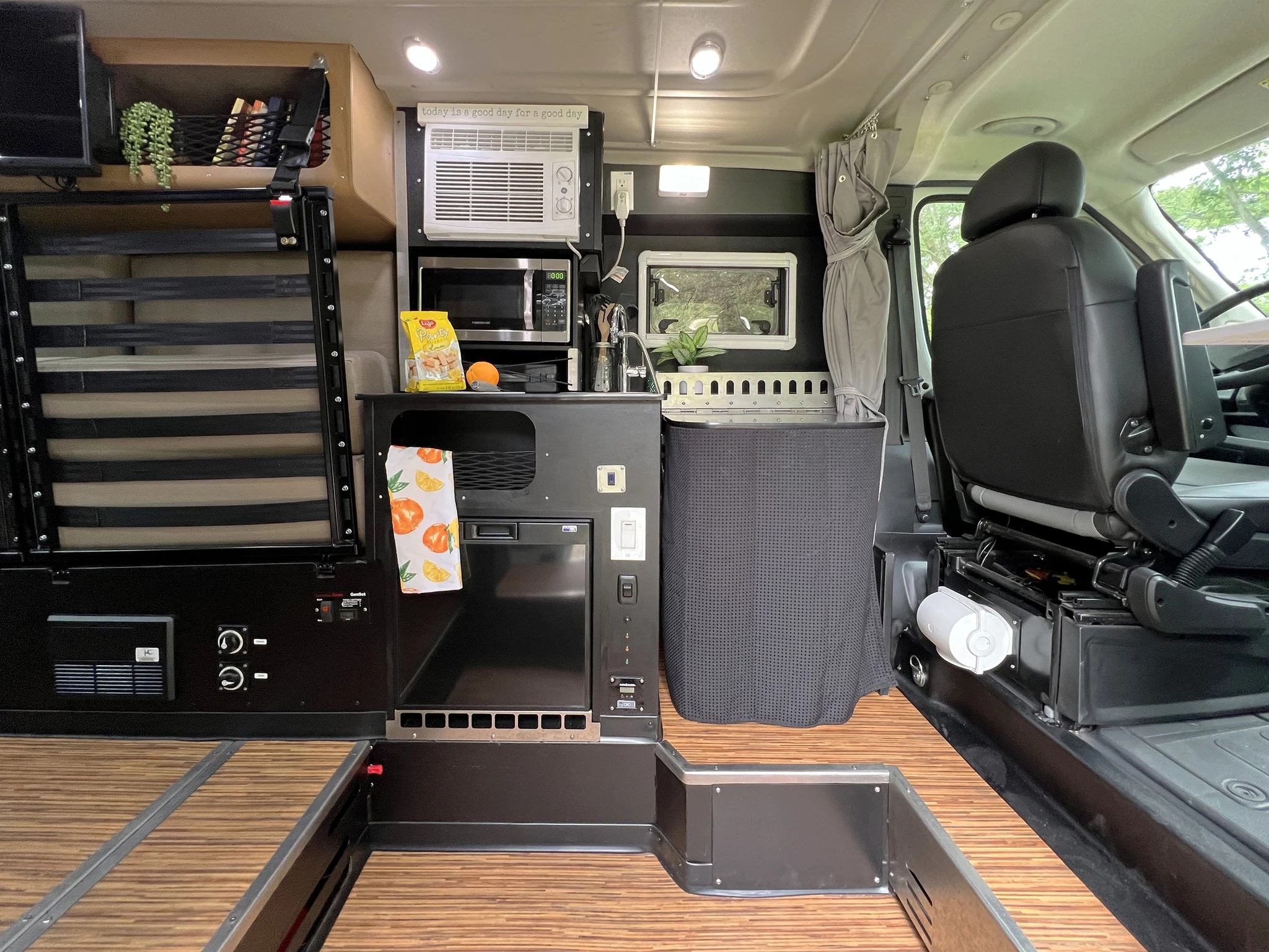 The Maxvan Access kitchen and shower benefit from the sunken floor area that creates a standing height over 6 feet