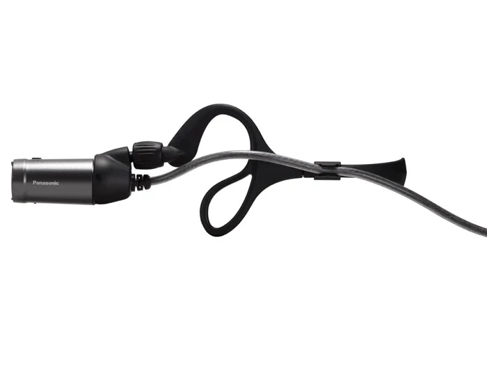 A side view of the the HX-A100 camera and headset/Earhook