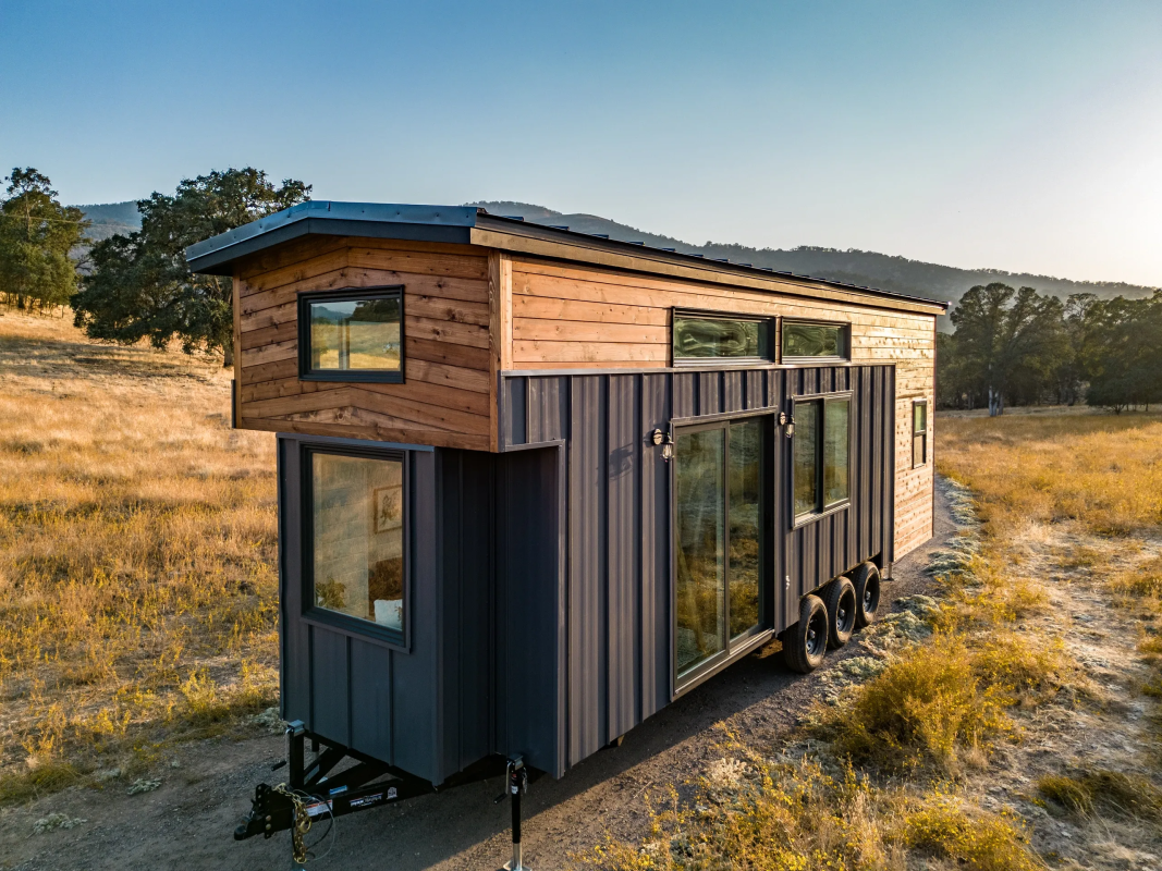 Rustic tiny house combines towability with a spacious and open interior