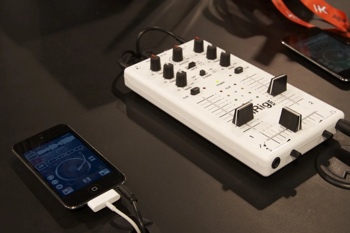 IK Multimedia's iRig MIX is a compact mobile mixer that can be used with the included DJ Rig app to mix tracks between two iOS devices