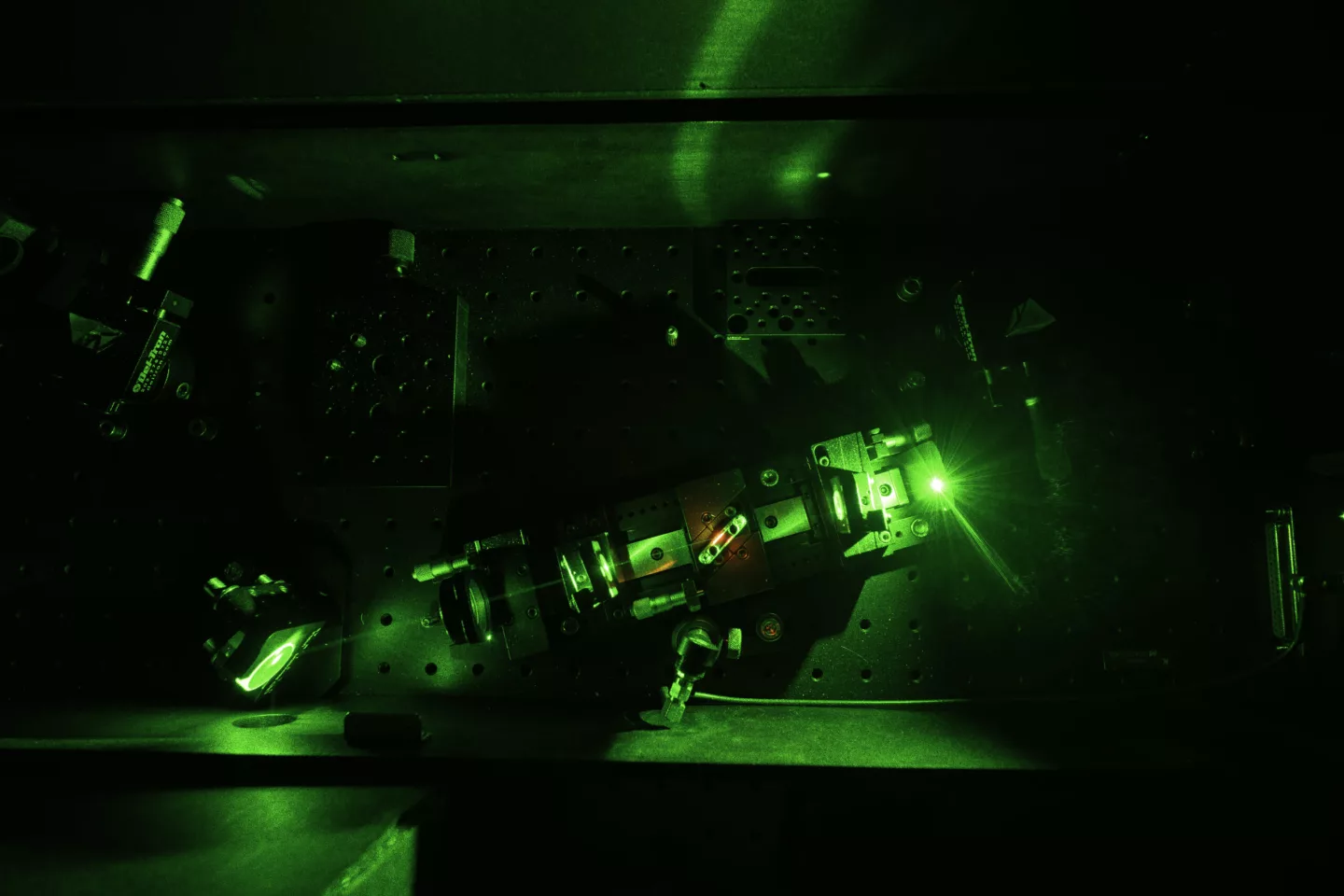 Gou's team uses a laser oscillator to generate light pulses for etching nanostructures onto thermoelectric generators