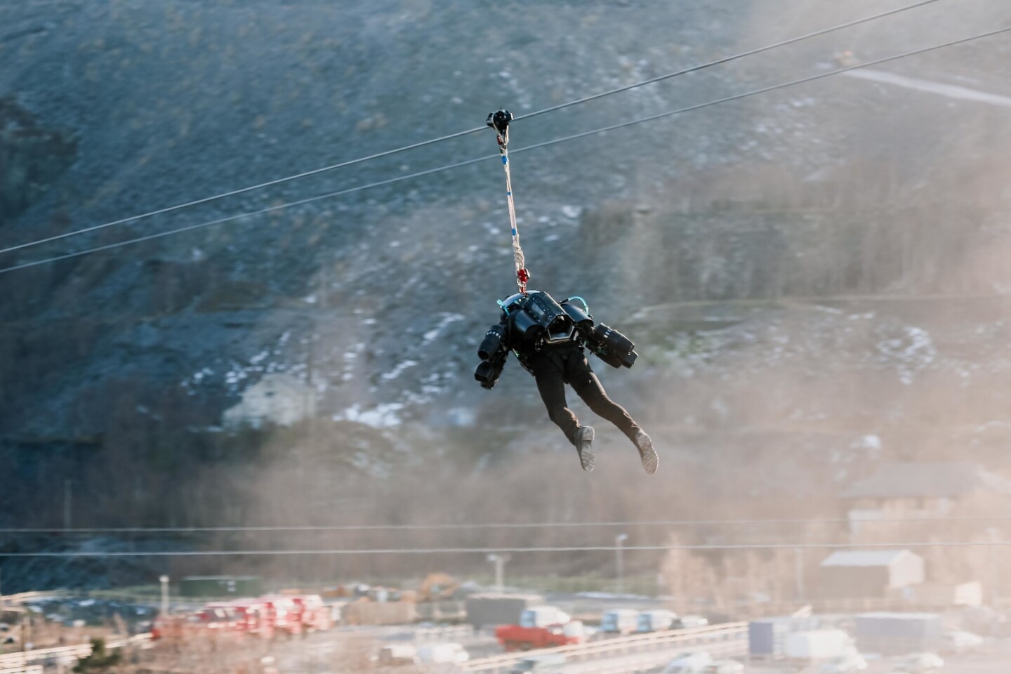 Tethered to the zip line, Browning is able to speed test the Gravity jet suit over land, without risking his skin