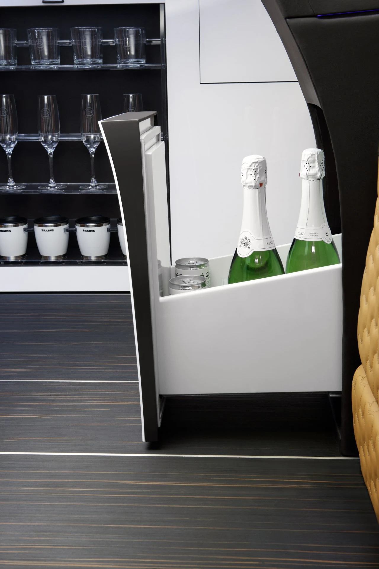 A mini refrigerator keeps cold drinks at the ready