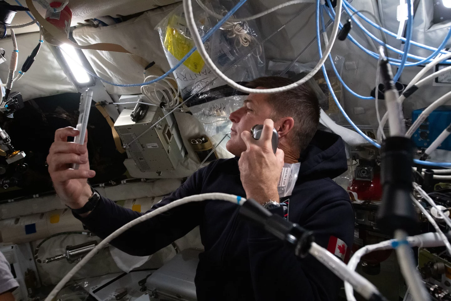Jeremy Hansen enjoys a shave inside the Orion spacecraft