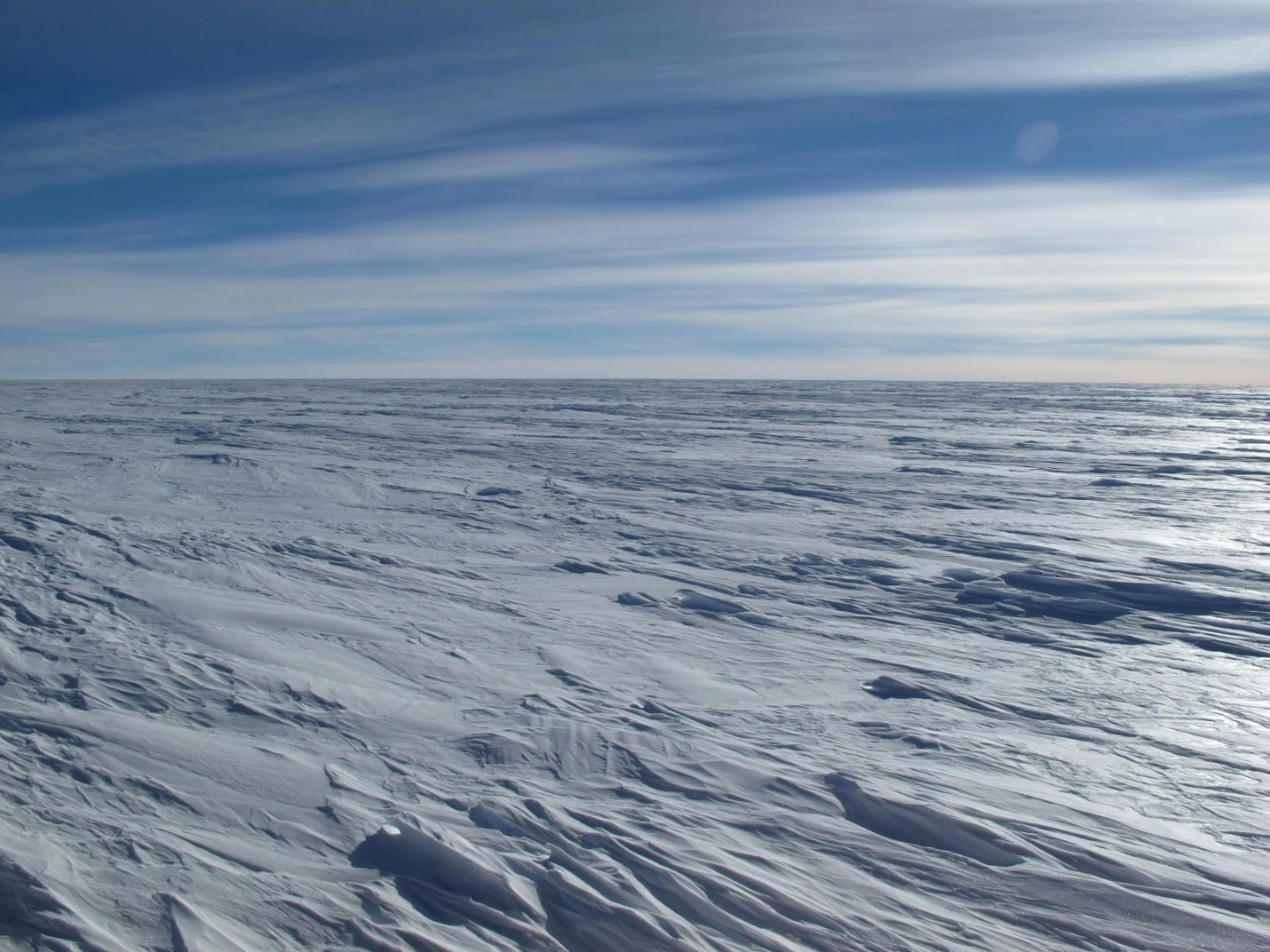 The coldest spots form when old, dense pockets of air are able to sit inside shallow dips in the ice sheet, and remain there for several days