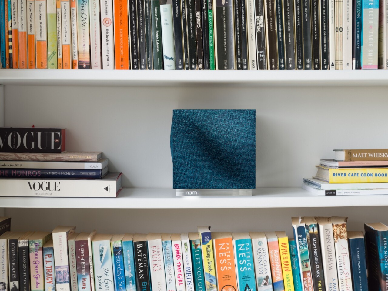 The Mu-so Qb 2nd Generation wireless music system is available with black, olive, peacock and terracotta grille options