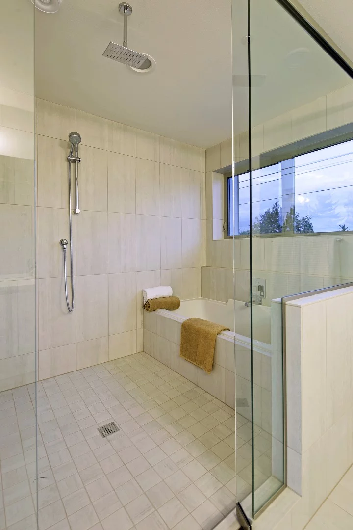 Large windows let natural light into some of the bathrooms