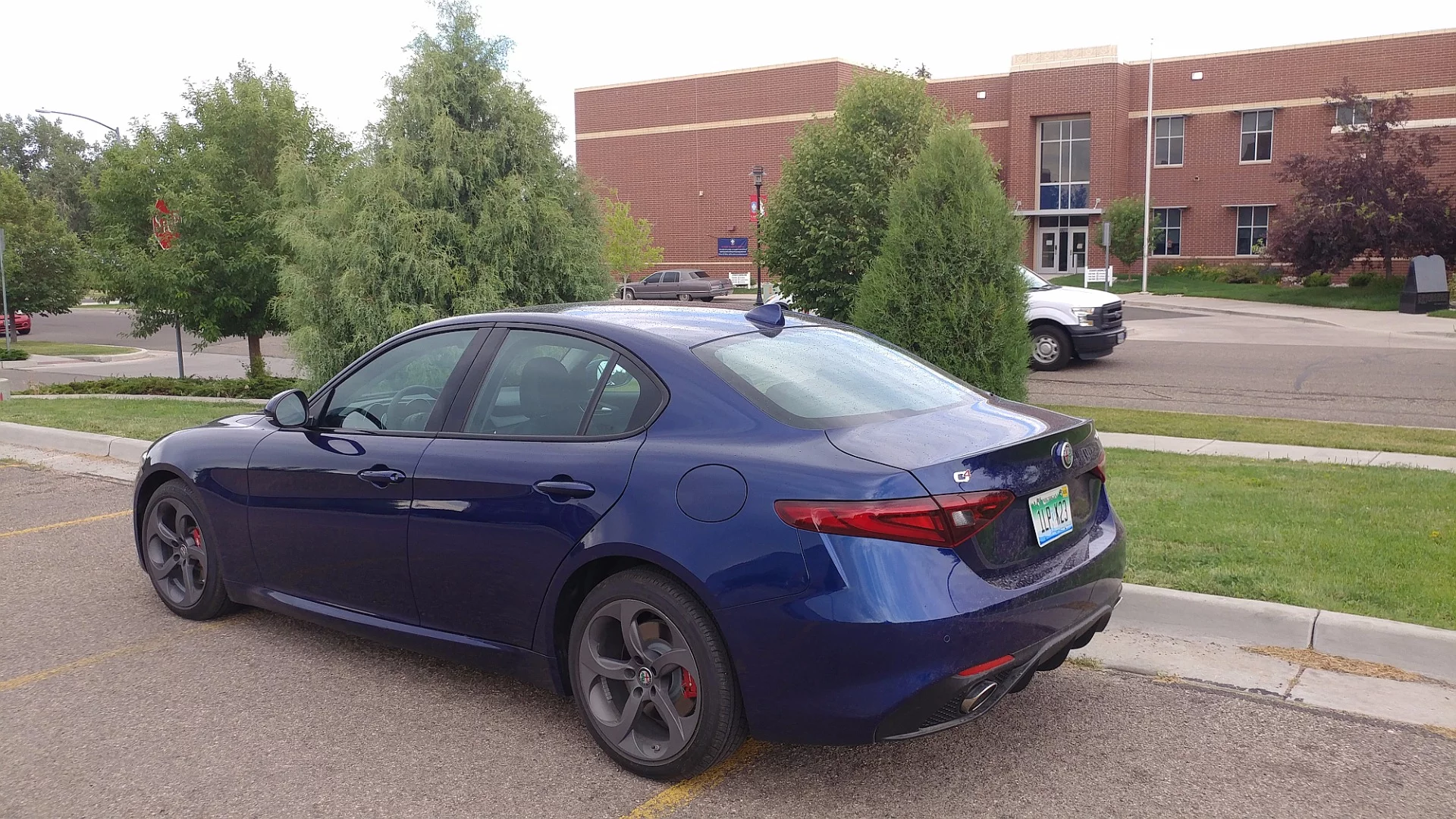 The curves around the taillamps, the edging for the deck lid, and the rounded bumper cover with its slight lines for decor are excellent touches to the Alfa Romeo Giulia