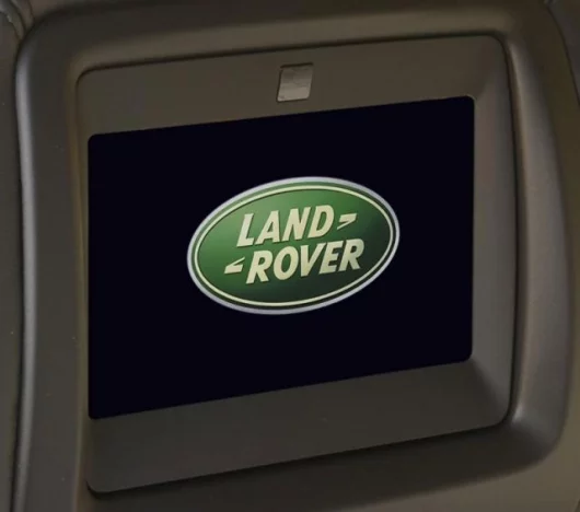 The two 6.5 inch widescreen displays are securely mounted in the front headrests