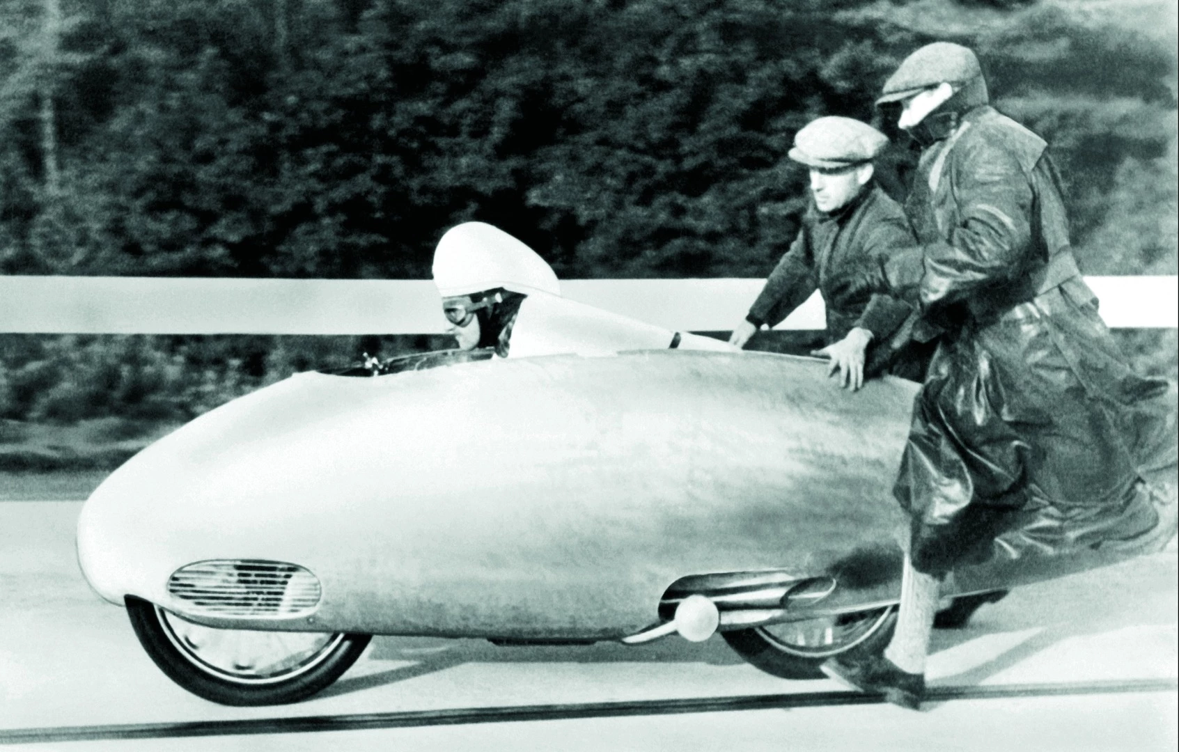 BMW took the record in 1930 with a run by Ernst Henne of 137.74 mph (221.67 km/h)
