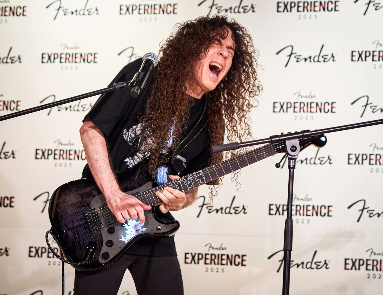 Marty Friedman rocks out on the MIJ Godzilla Stratocaster. Editor's note: weirdly, some of my guitars look very similar to this under UV light, and they don't have GLO systems built in