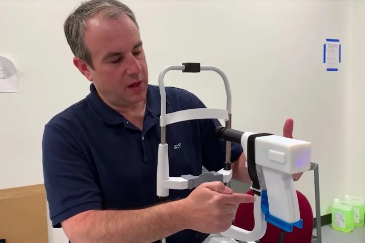 Prof. Adam Wax with the prototype OCT scanner